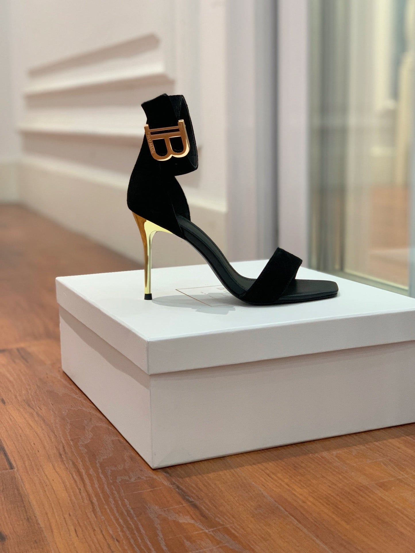 BALMAIN 25S THIN STRAP HIGH HEELS 105MM IN BLACK SUEDE GOLD HARDWARE - 36