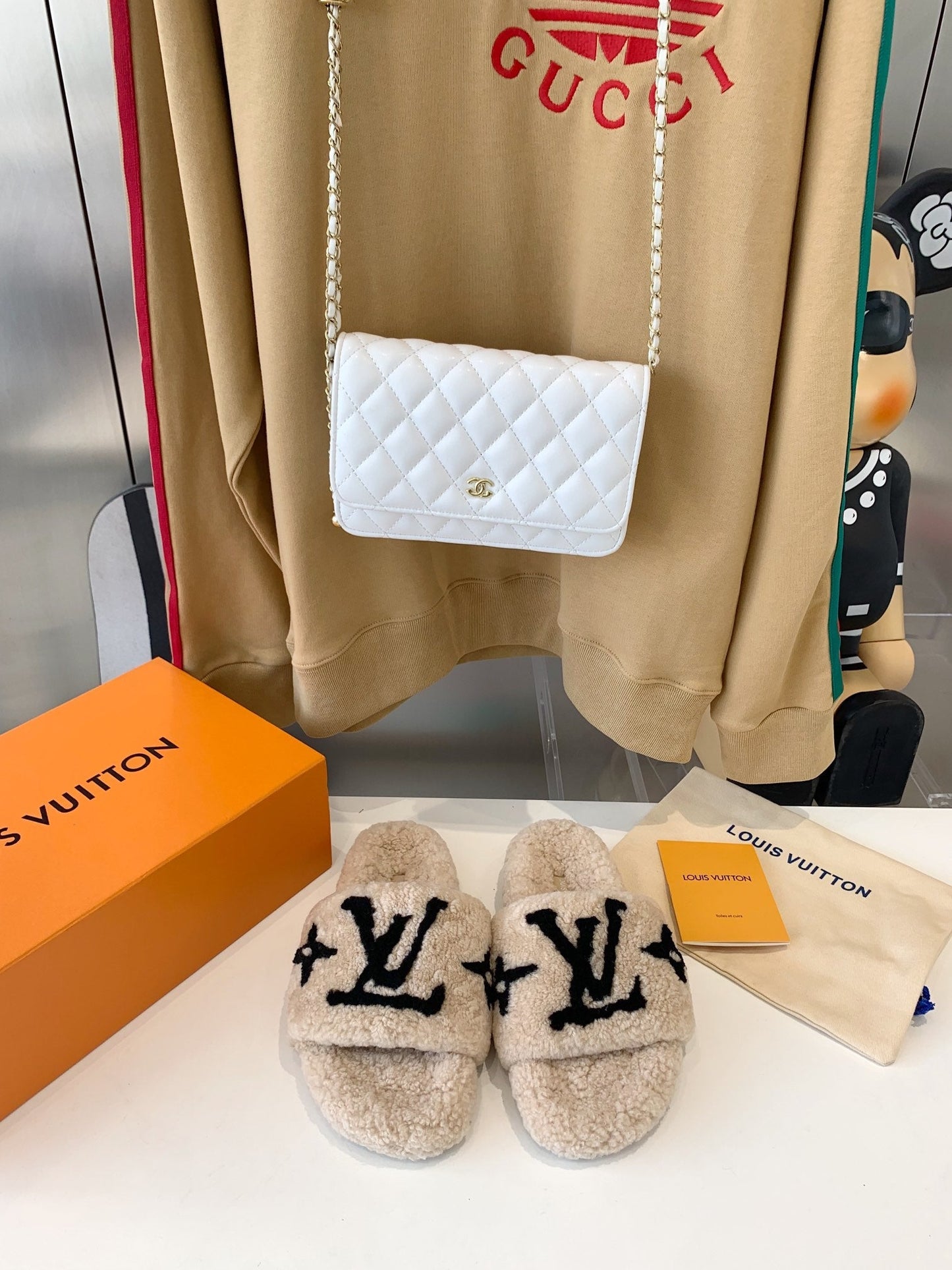 LV WOMEN'S PASEO FLAT SLIPPER IN TAN BROWN FLEECE WITH BLACK LOGO - 35
