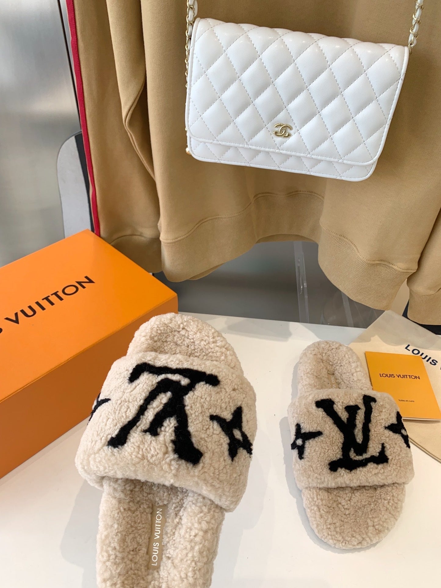 LV WOMEN'S PASEO FLAT SLIPPER IN TAN BROWN FLEECE WITH BLACK LOGO - 35