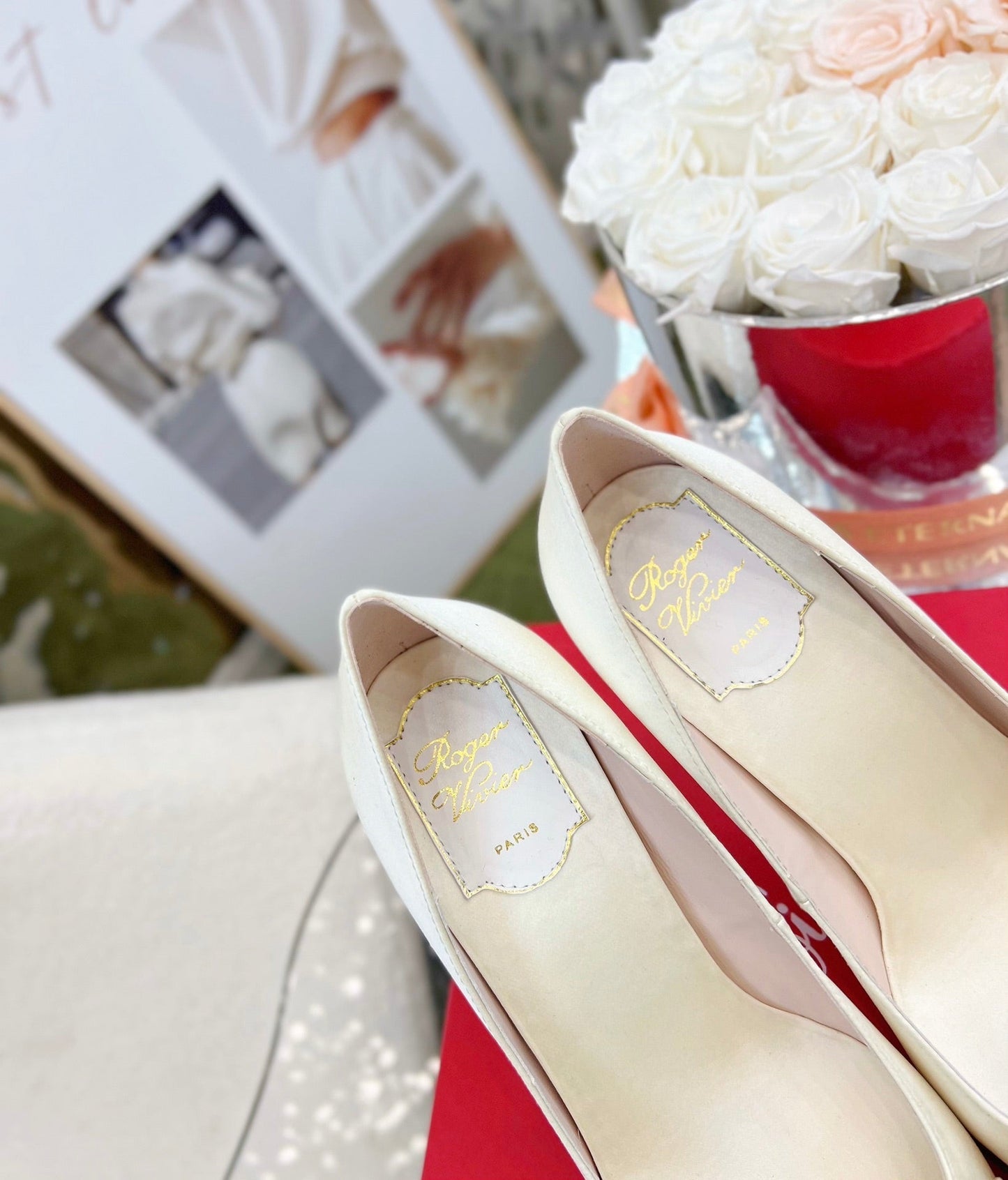 EFFLORESCENCE POINTED-TOE PUMPS IN WHITE SATIN WITH CRYSTAL BUCKLE - 35