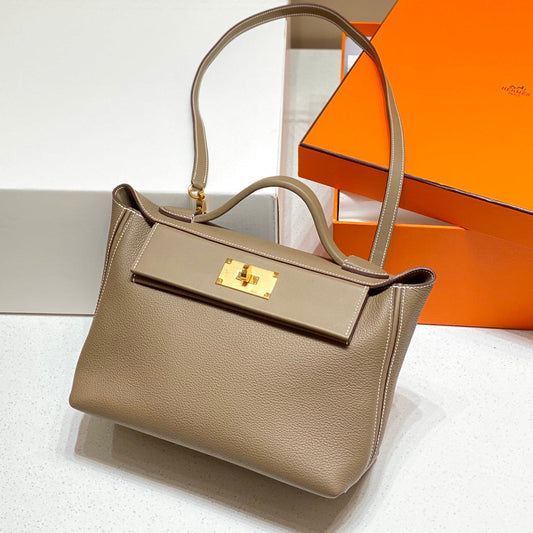 HM 26S 24/24 29MM З КОРИЧНЕВОЇ ШКІРИ EVERCOLOR CALFSKIN ІЗ ЗОЛОТОЮ ПРЯЖКОЮ KELLY