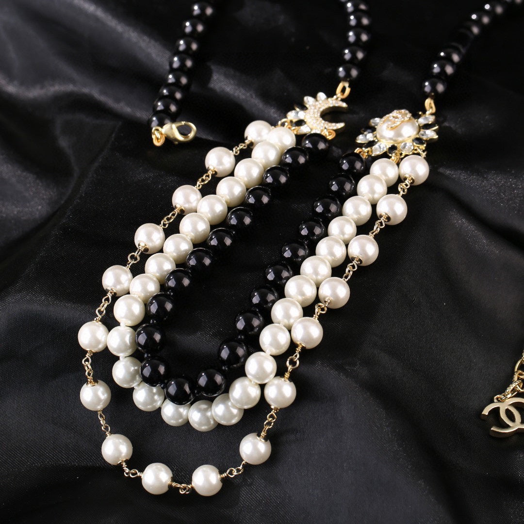 CHANEL 25S CHAIN BELT IN WHITE AND BLACK PEARL 614477 - 30