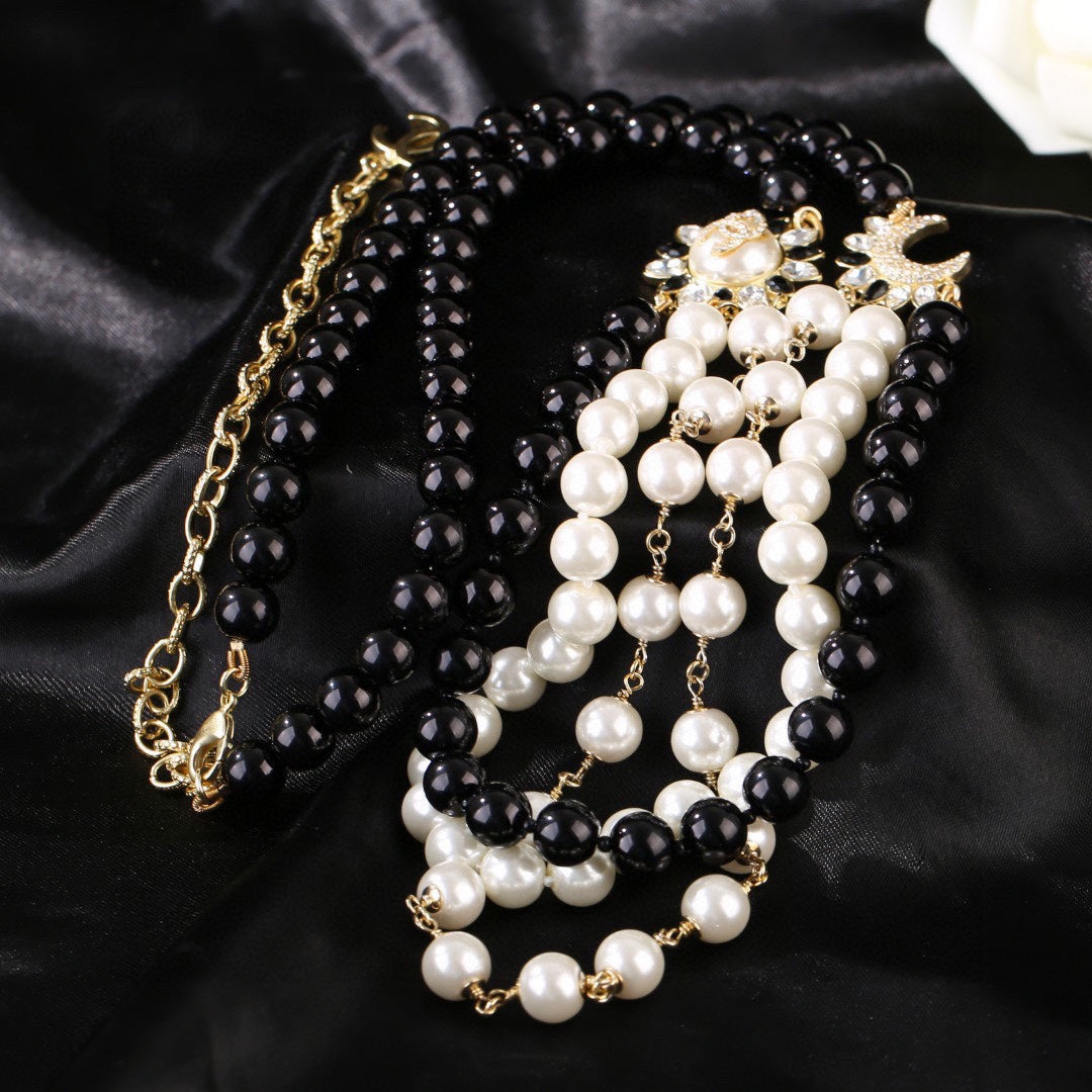 CHANEL 25S CHAIN BELT IN WHITE AND BLACK PEARL 614477 - 30