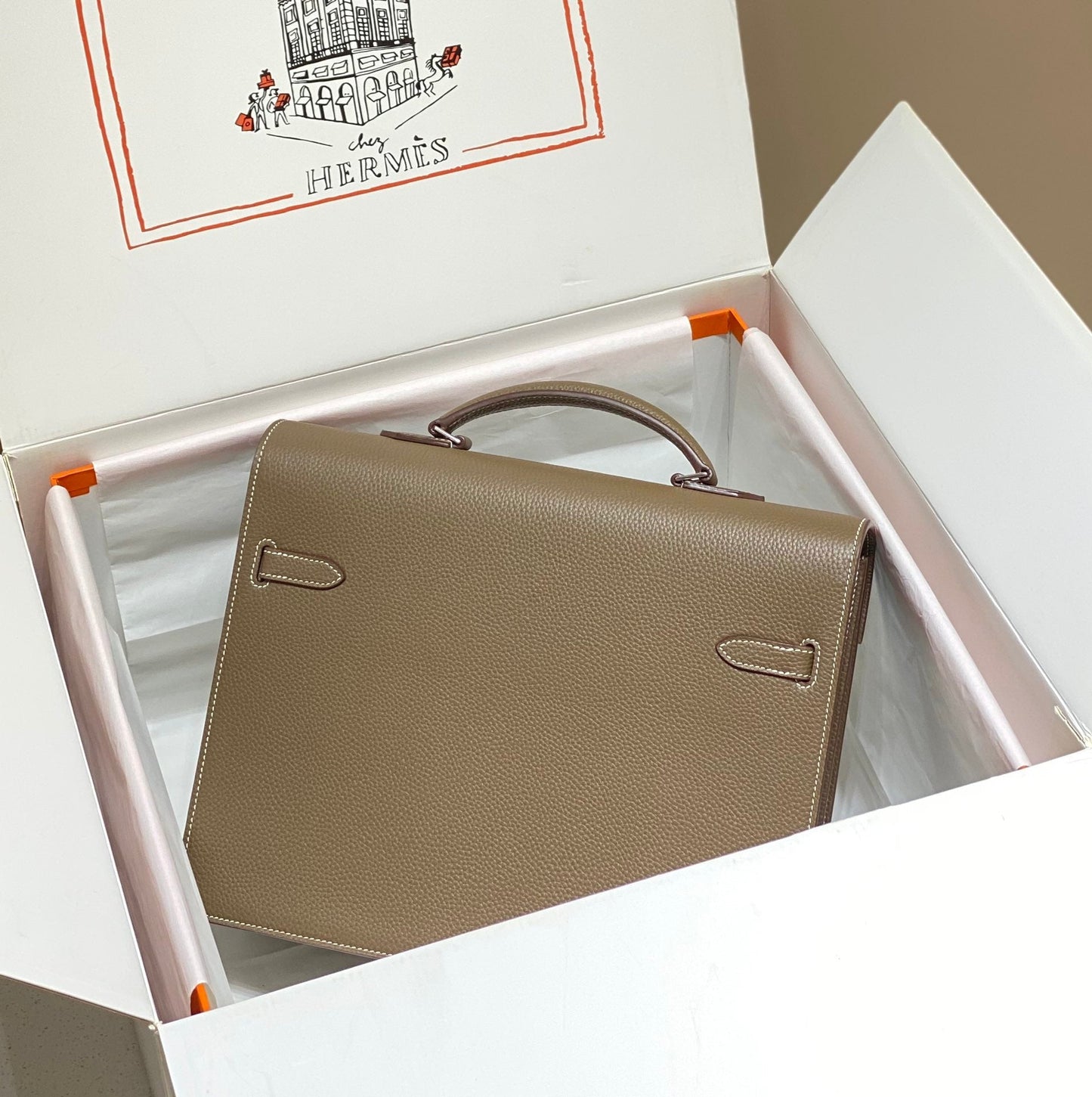 KELLY DEPECHES 34 BRIEFCASE IN ETOUPE TOGO CALFSKIN SILVER HARDWARE
