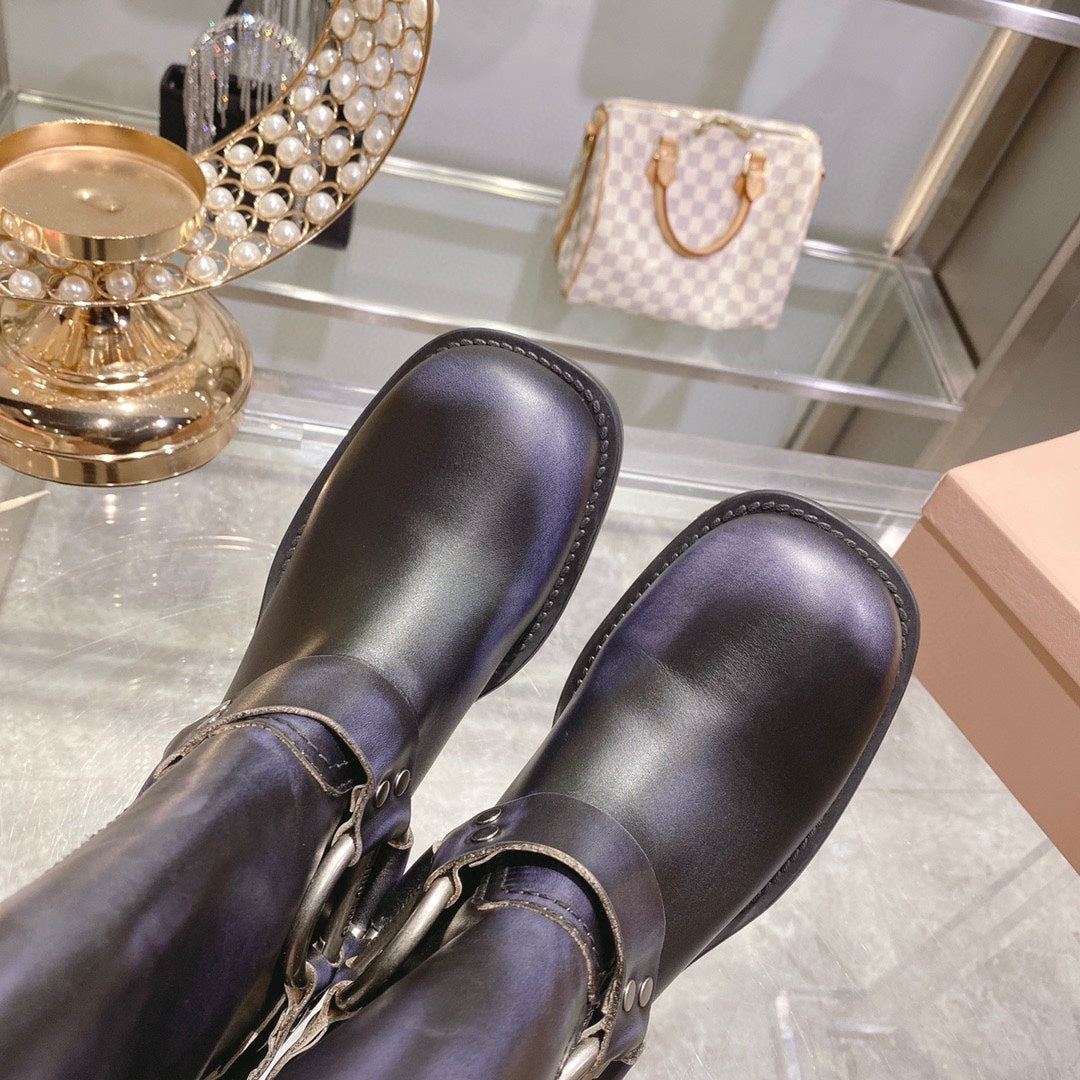 THICK-SOLED BUCKLE BOOTS IN BLACK CALFSKIN - 35