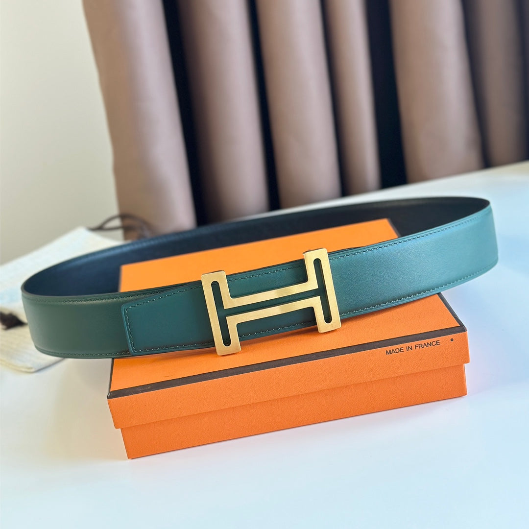 HM  BELT BUCKLE & REVERSIBLE TEAL GREEN AND BLACK LEATHER STRAP 38MM GOLD HARDWARE - 30