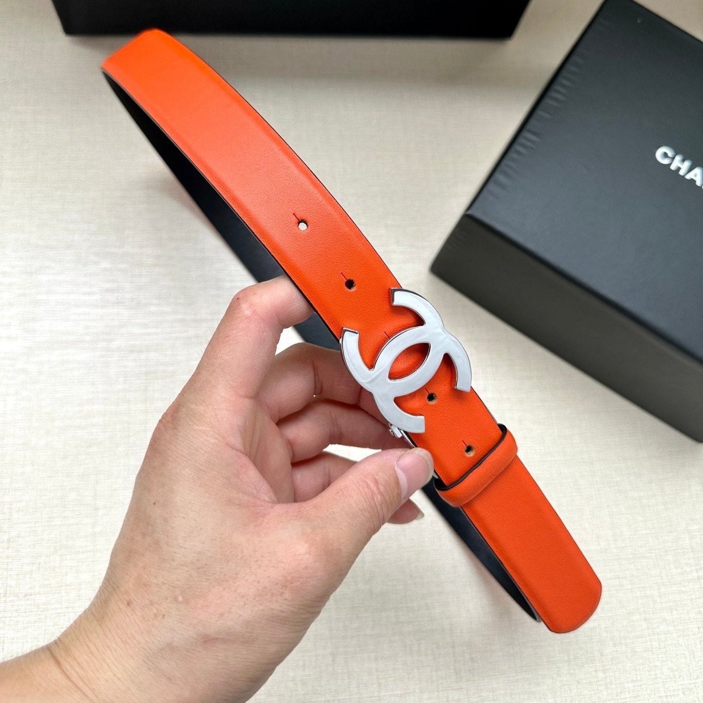CC 30MM BELT IN FIRE ORANGE AND BLACK CALFSKIN WITH SILVER HARDWARE - 30