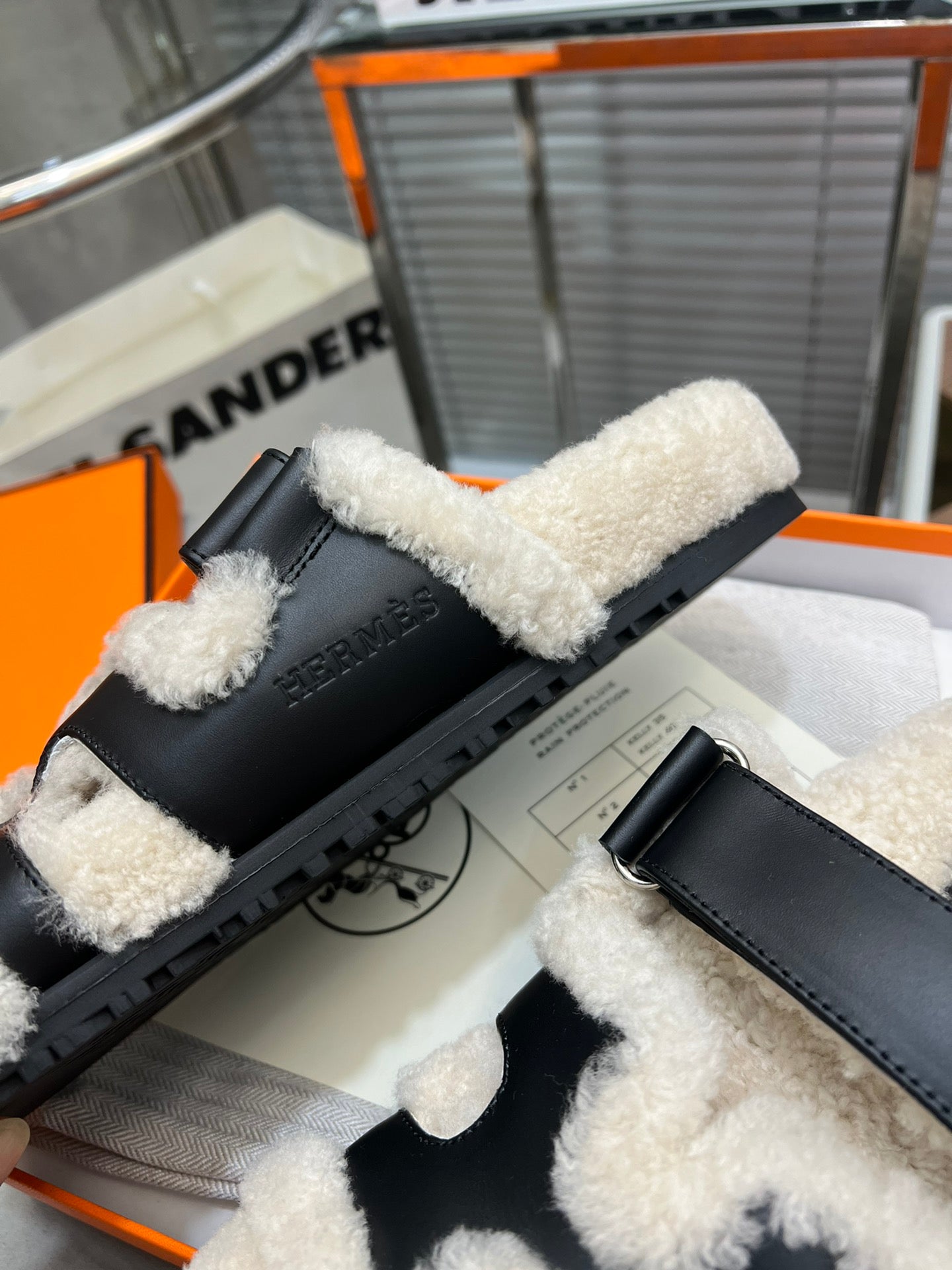 CHYPRE SLIPPERS IN BEIGE LAMB WOOL AND BLACK CALFSKIN - 35
