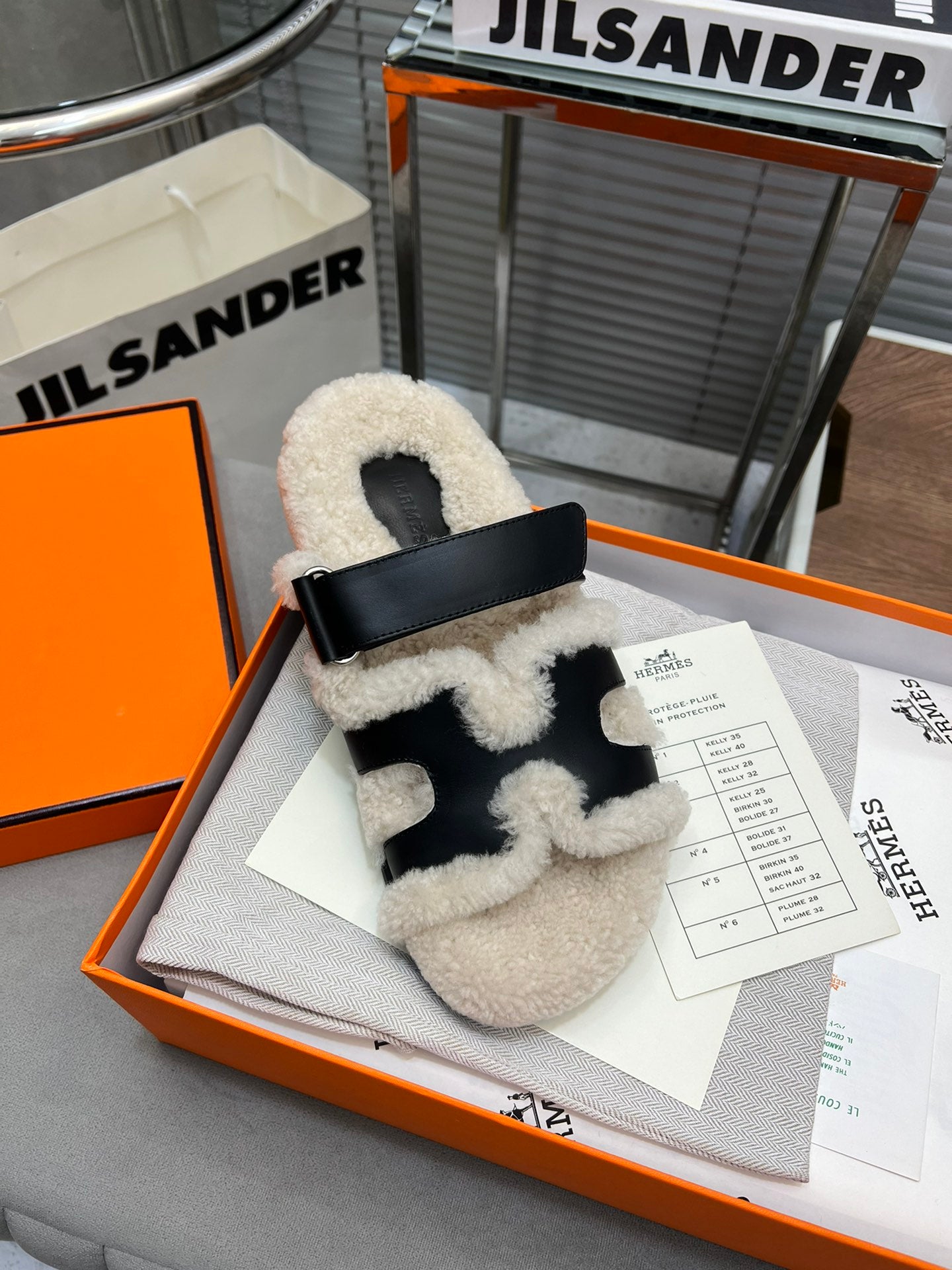 CHYPRE SLIPPERS IN BEIGE LAMB WOOL AND BLACK CALFSKIN - 35
