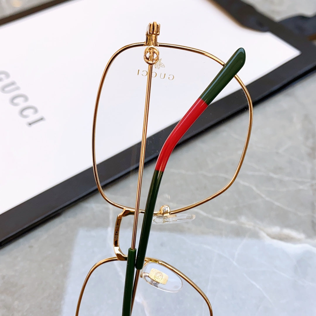 SQUARE FRAME SUNGLASSES GG0396O IN METAL - Gold/ orange