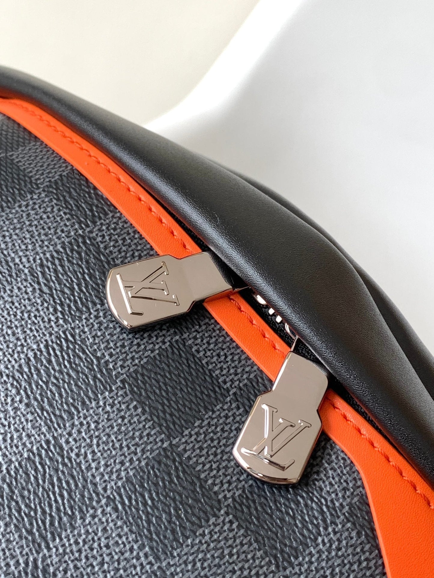 LV 25S BUMBAG 37 IN BLACK AND ORANGE COATED MONOGRAM CALFSKIN
