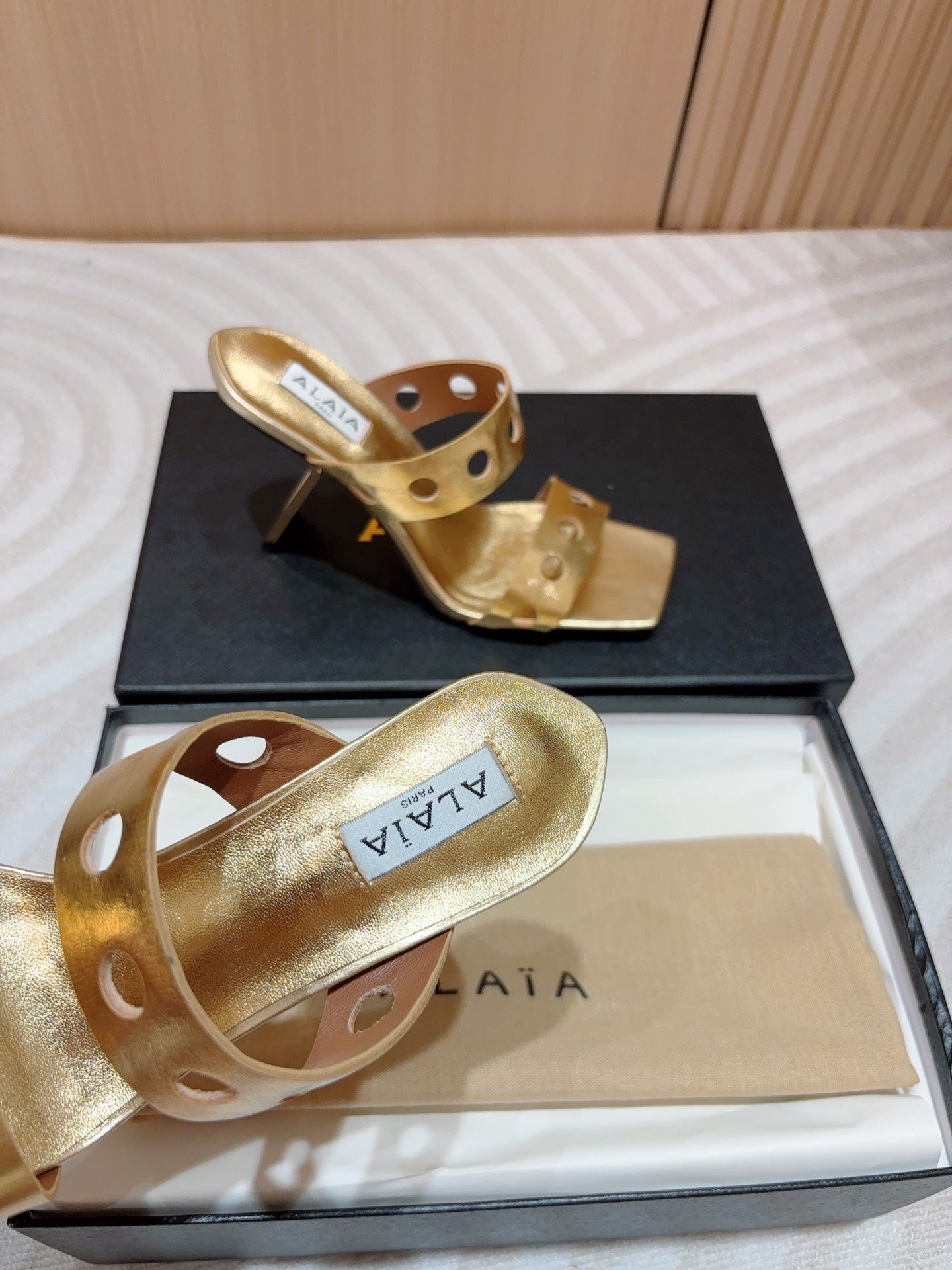 ALAIA TWO-STRAPS HIGH HEEL SANDALS IN GOLDEN PATENT LAMBSKIN - 35
