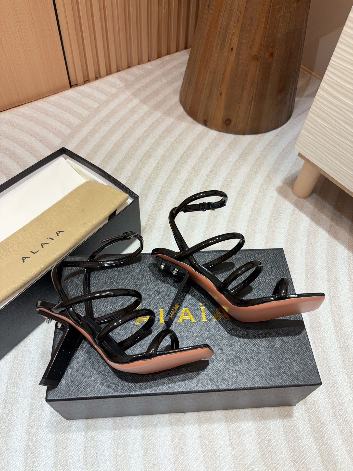 ALAIA THREE-STRAPS HIGH HEEL SANDALS IN BLACK PATENT LAMBSKIN - 35