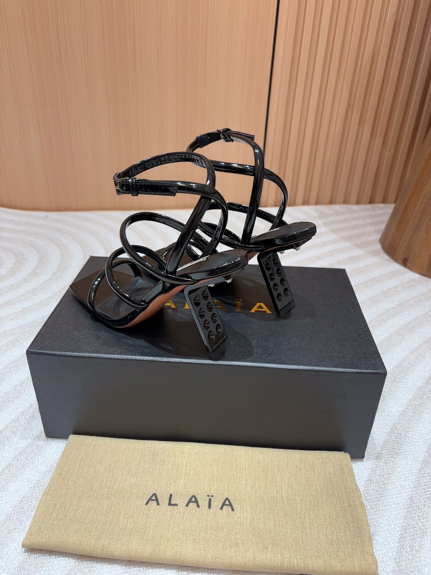 ALAIA THREE-STRAPS HIGH HEEL SANDALS IN BLACK PATENT LAMBSKIN - 35