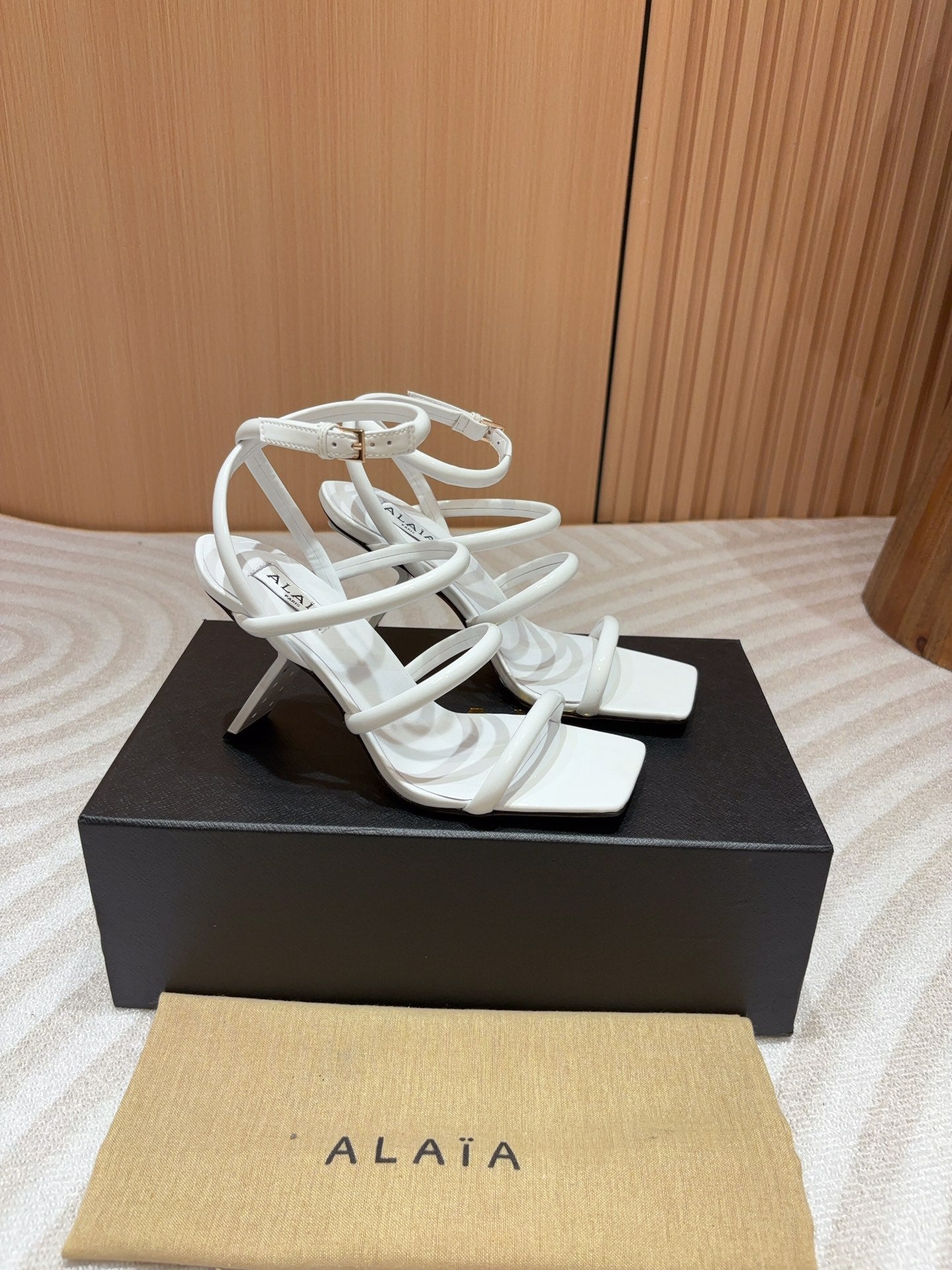 ALAIA THREE-STRAPS HIGH HEEL SANDALS IN WHITE PATENT LAMBSKIN - 35