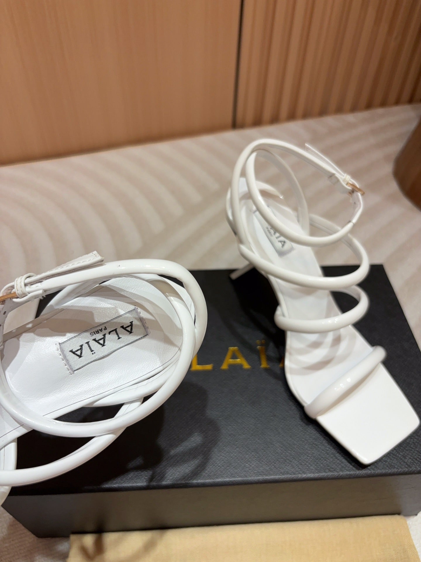 ALAIA THREE-STRAPS HIGH HEEL SANDALS IN WHITE PATENT LAMBSKIN - 35