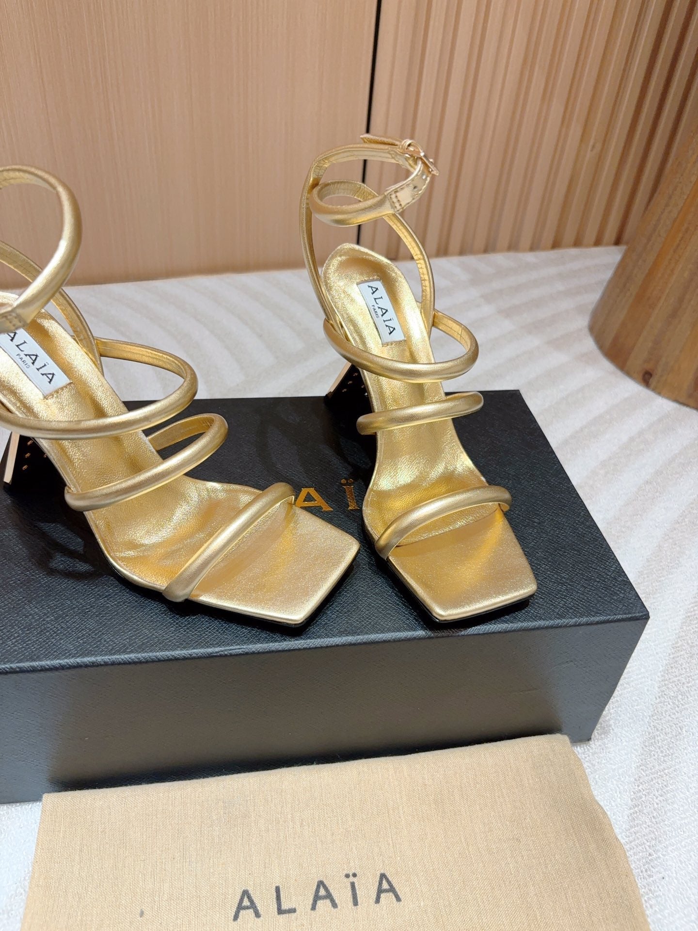ALAIA THREE-STRAPS HIGH HEEL SANDALS IN GOLDEN PATENT LAMBSKIN - 35
