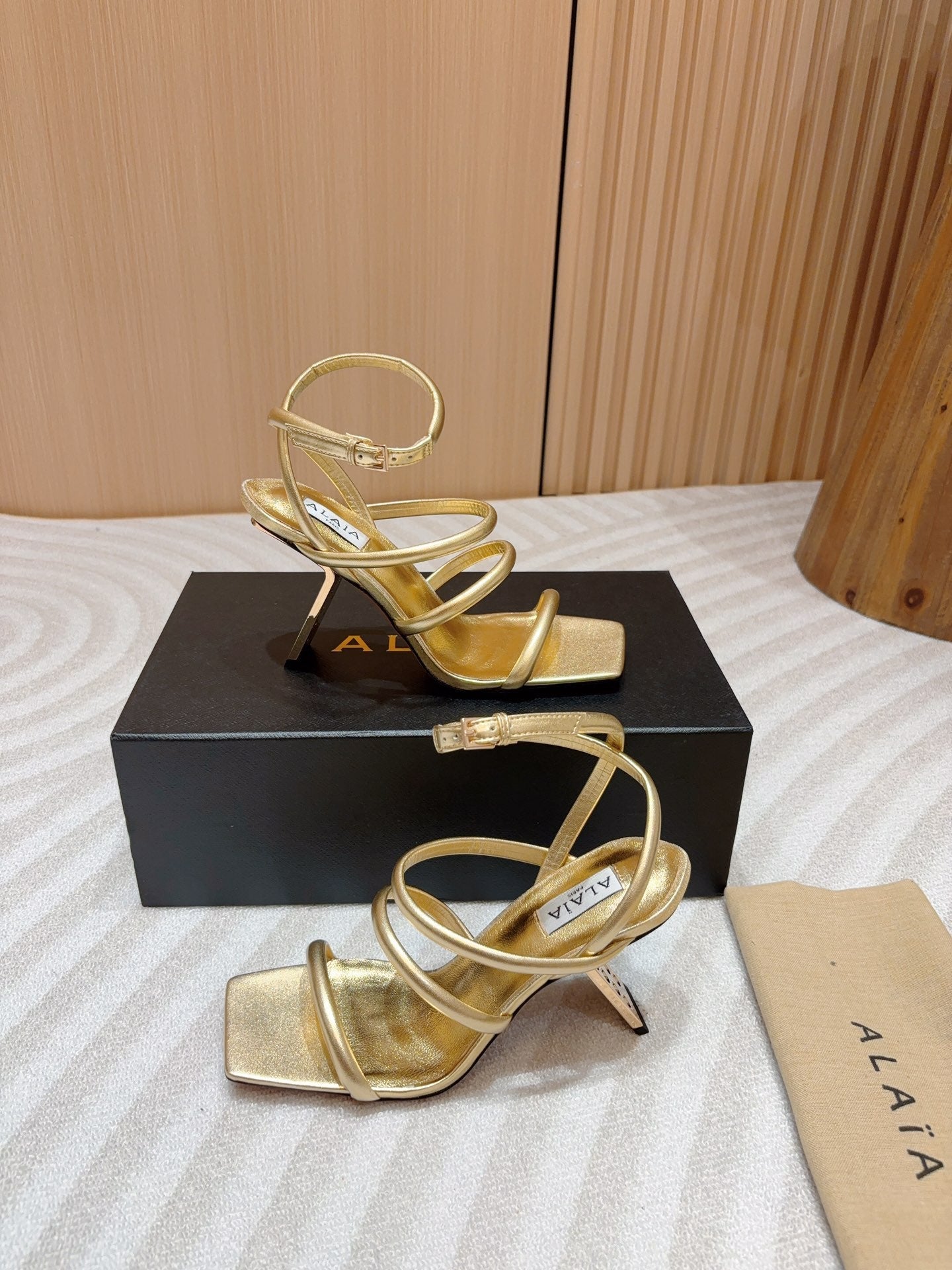 ALAIA THREE-STRAPS HIGH HEEL SANDALS IN GOLDEN PATENT LAMBSKIN - 35