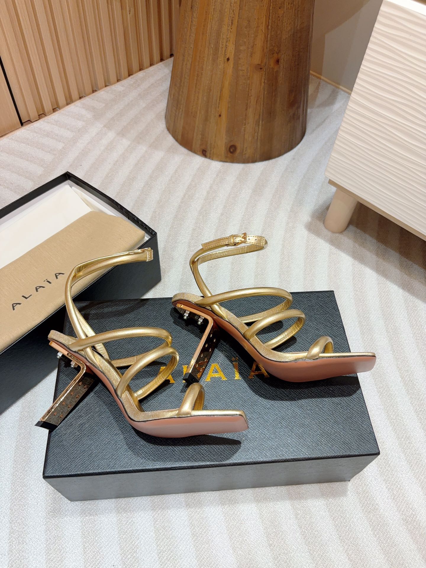 ALAIA THREE-STRAPS HIGH HEEL SANDALS IN GOLDEN PATENT LAMBSKIN - 35