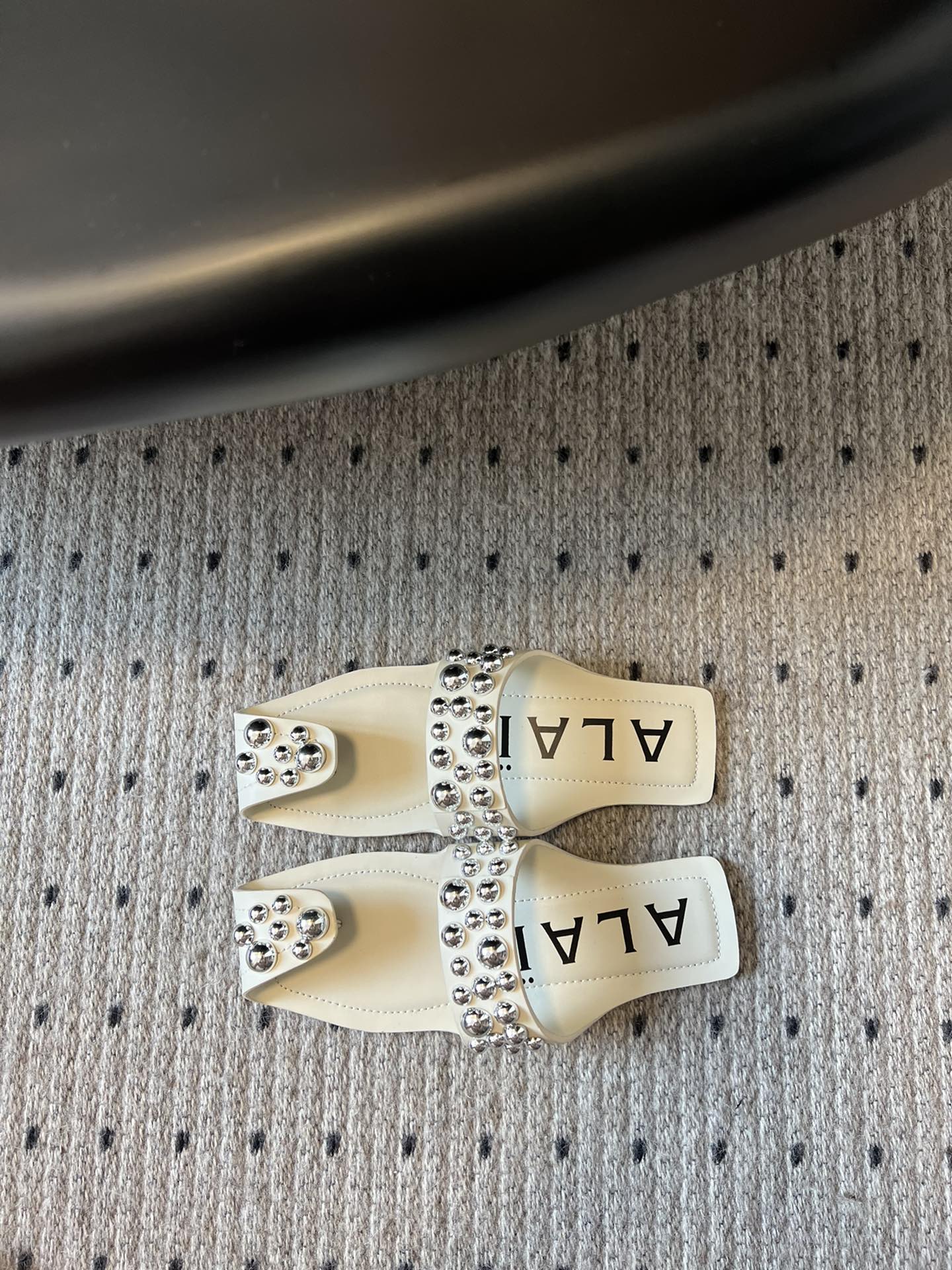 ALAIA FOLDED FLAT MULES WITH SPHERES ON WHITE CALFSKIN - 35