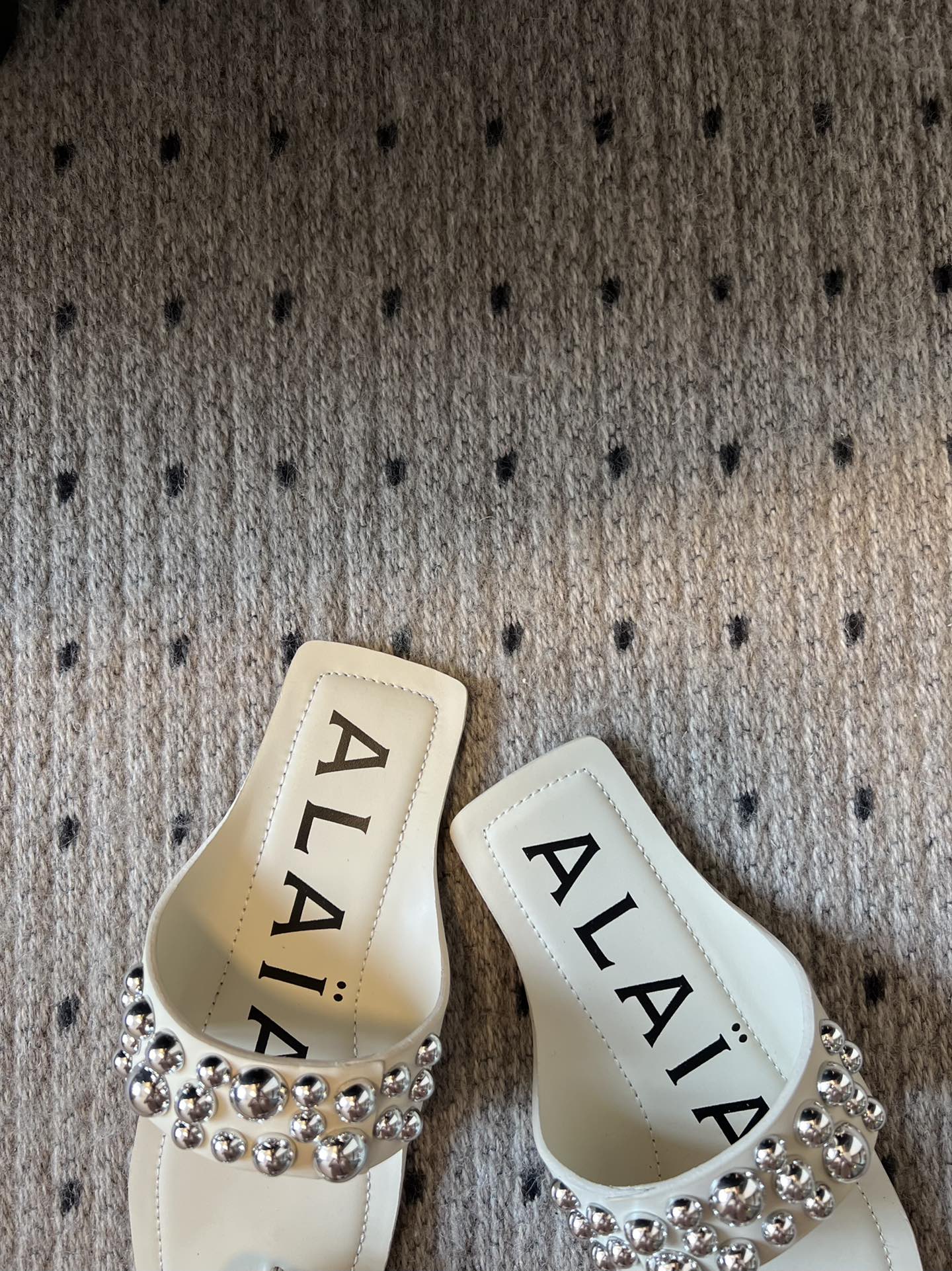 ALAIA FOLDED FLAT MULES WITH SPHERES ON WHITE CALFSKIN - 35