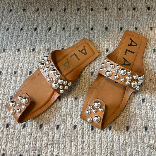 ALAIA FOLDED FLAT MULES WITH SPHERES ON COPPER BROWN CALFSKIN - 35