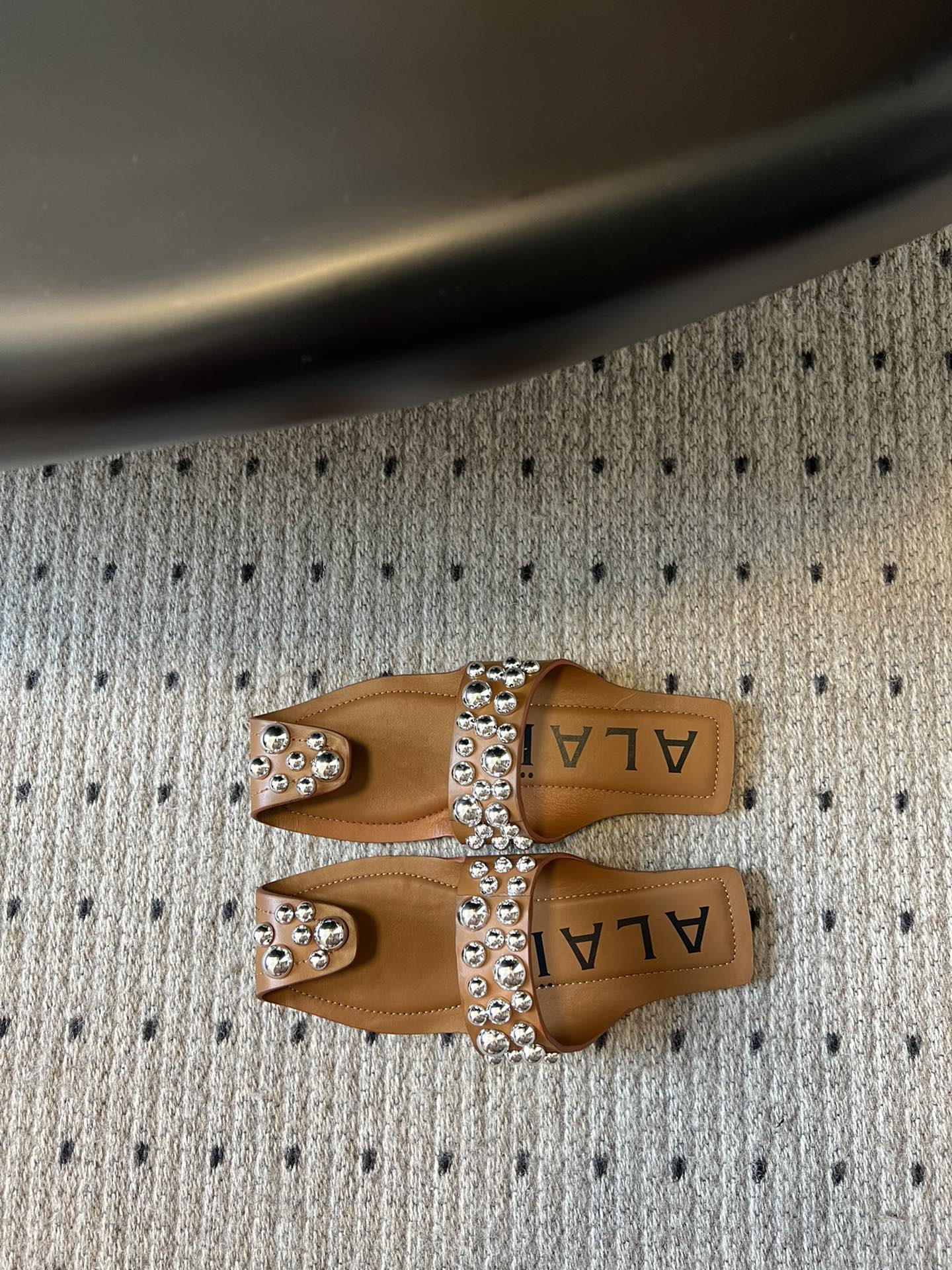 ALAIA FOLDED FLAT MULES WITH SPHERES ON COPPER BROWN CALFSKIN - 35