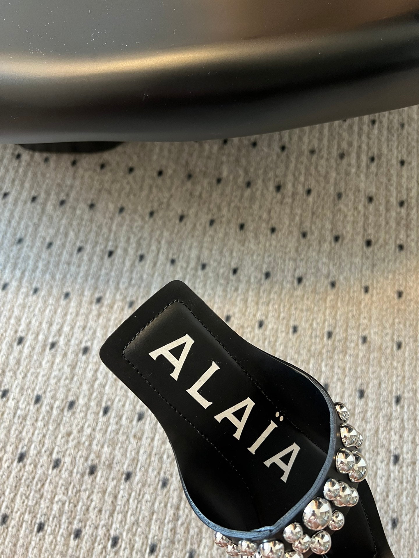 ALAIA FOLDED FLAT MULES WITH SPHERES ON BLACK CALFSKIN - 35