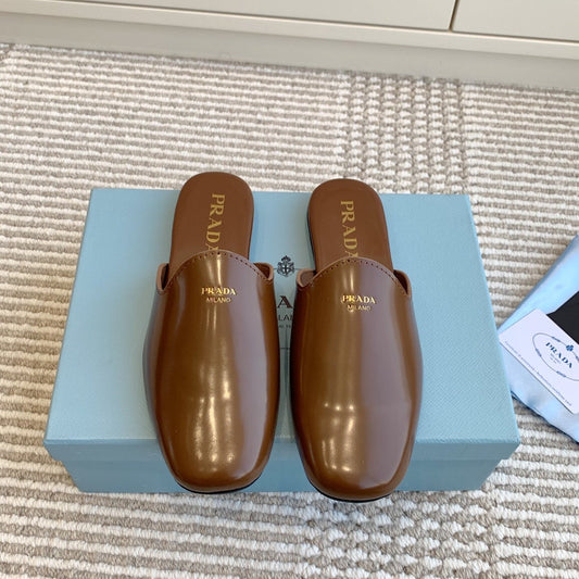 MULES IN BROWN GLOSSY SHEEPSKIN GOLD LETTERING LOGO - 35