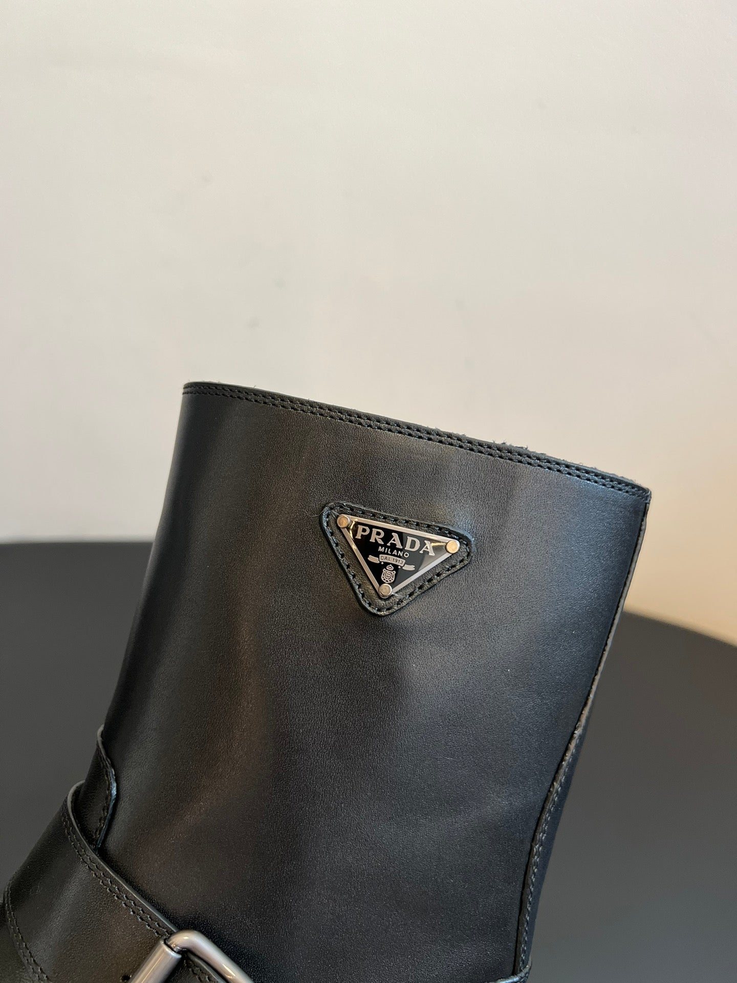 PRADA 25S PLATFORM ANKLE BOOTS IN BLACK CALFSKIN WITH SILVER HARDWARE - 35