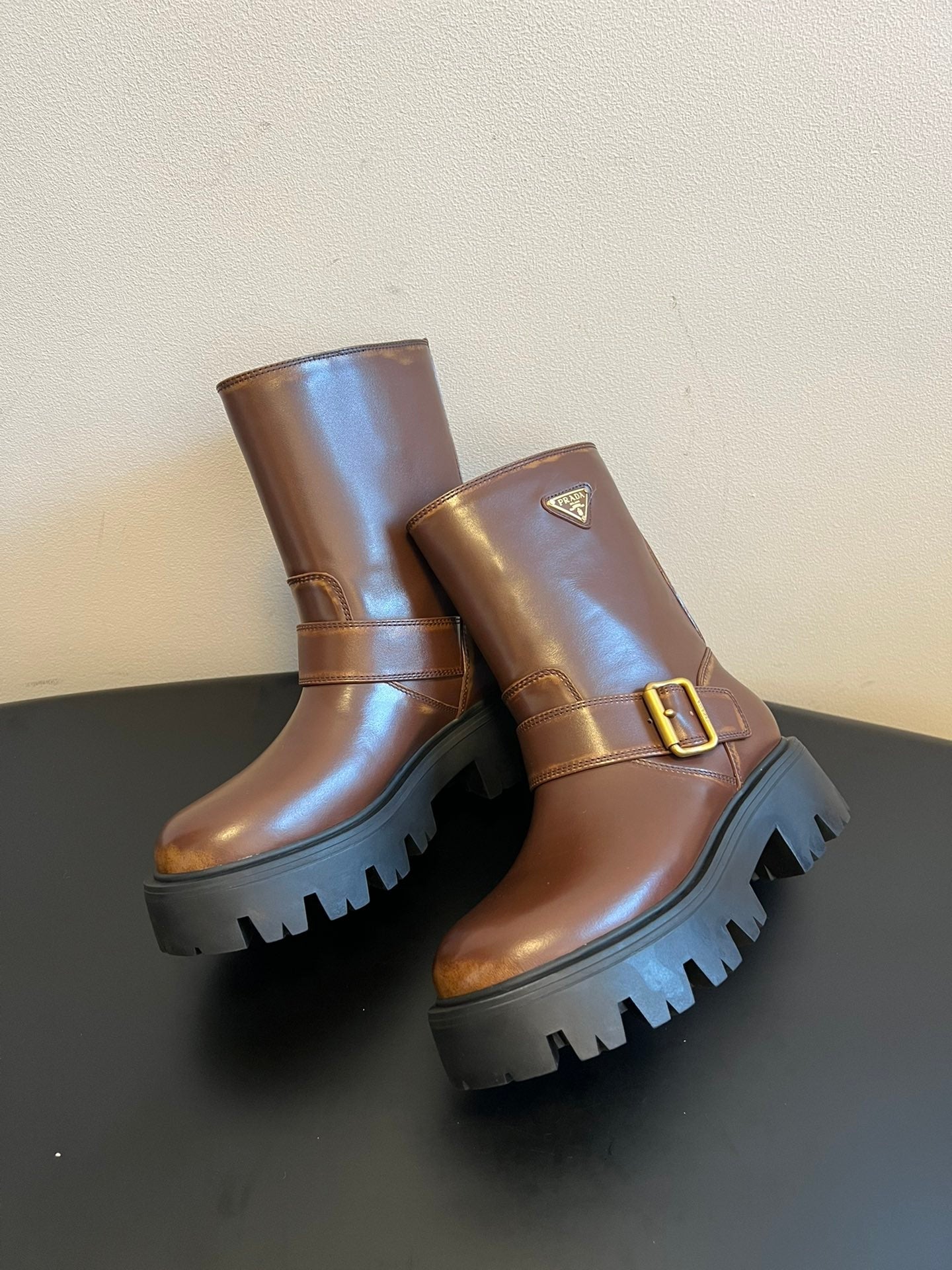 PRADA 25S PLATFORM ANKLE BOOTS IN BROWN CALFSKIN WITH GOLD HARDWARE - 35