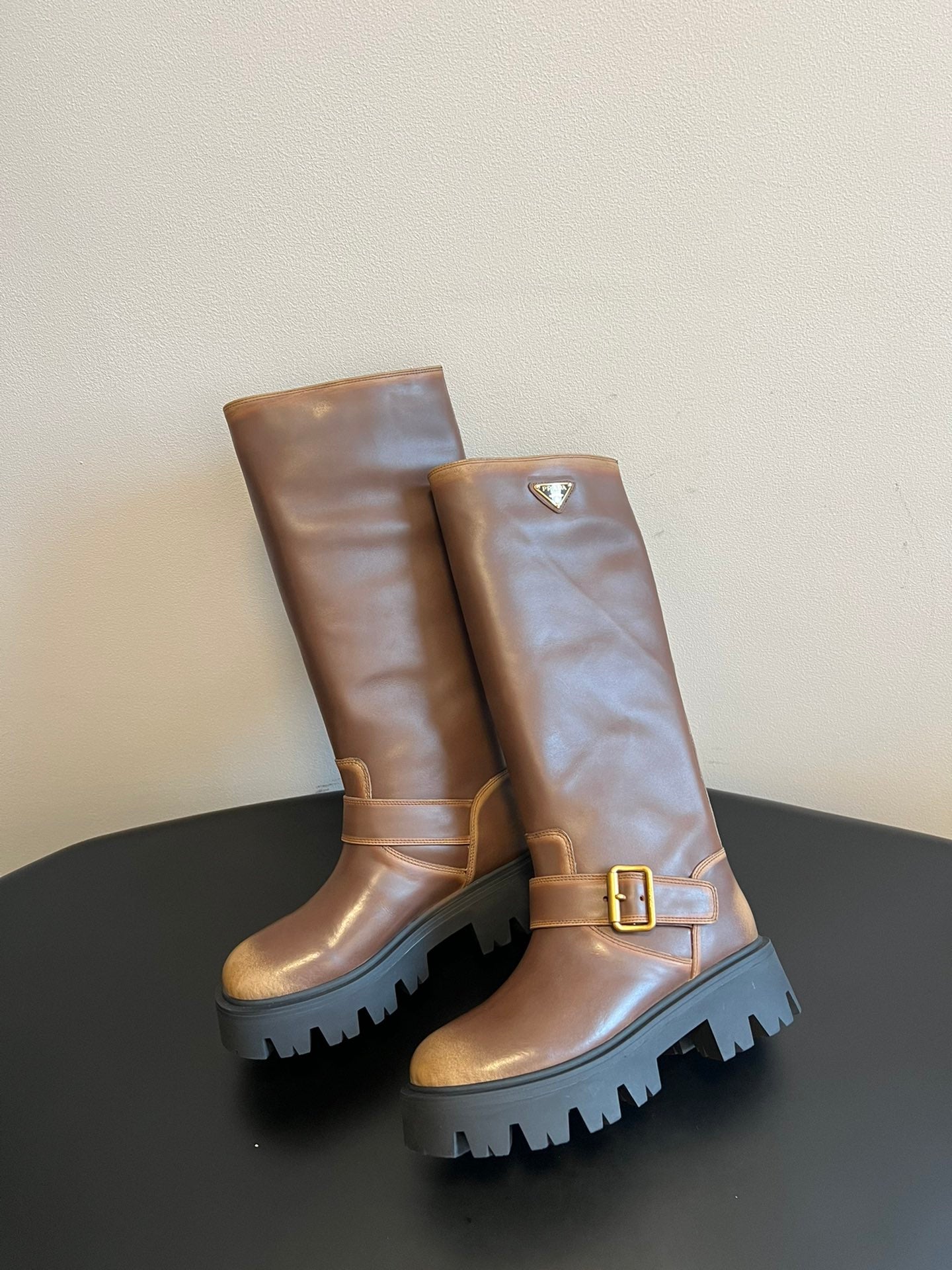 PRADA 25S HIGH-CUT PLATFORM BOOTS IN BROWN CALFSKIN WITH GOLD HARDWARE - 35