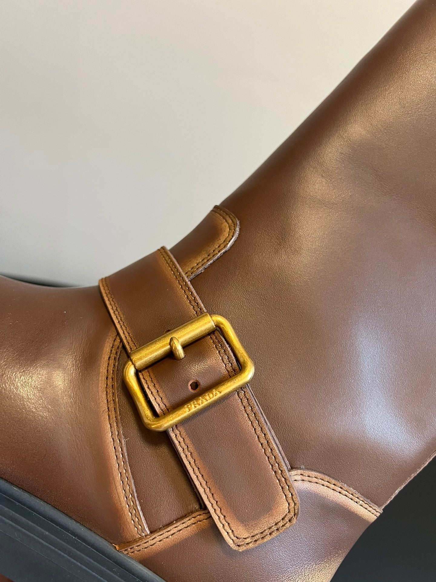 PRADA 25S HIGH-CUT PLATFORM BOOTS IN BROWN CALFSKIN WITH GOLD HARDWARE - 35