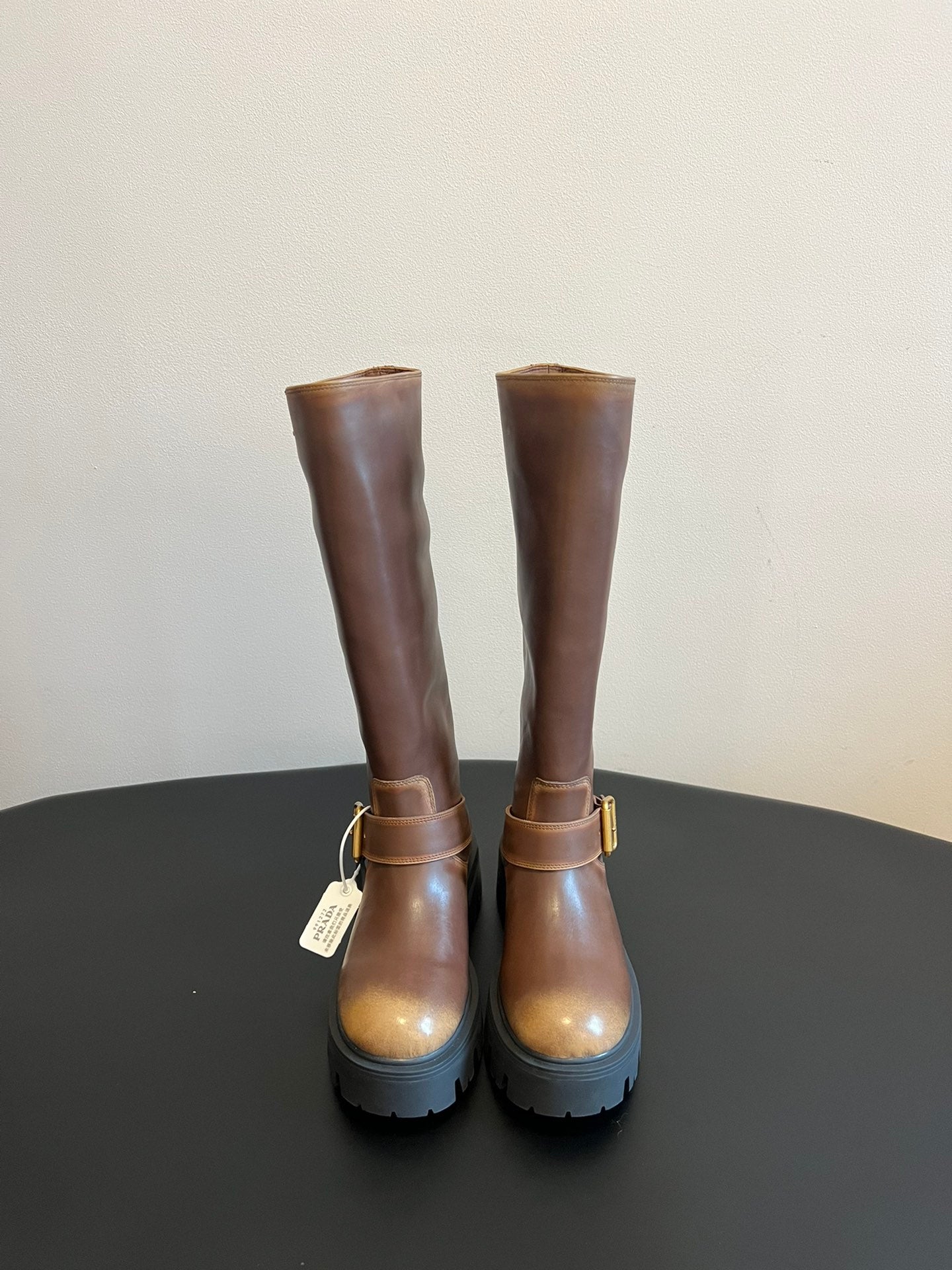 PRADA 25S HIGH-CUT PLATFORM BOOTS IN BROWN CALFSKIN WITH GOLD HARDWARE - 35