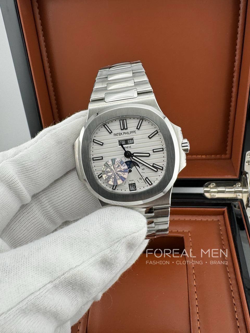 Patek Philippe Nautilus Stainless Steel Watch with White Dial & Annual Calendar