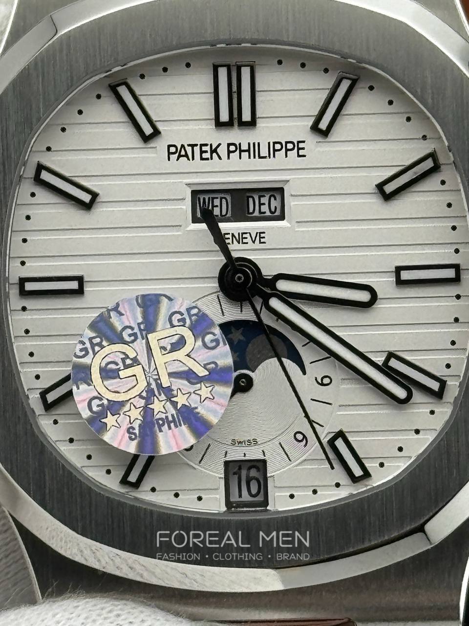 Patek Philippe Nautilus Stainless Steel Watch with White Dial & Annual Calendar