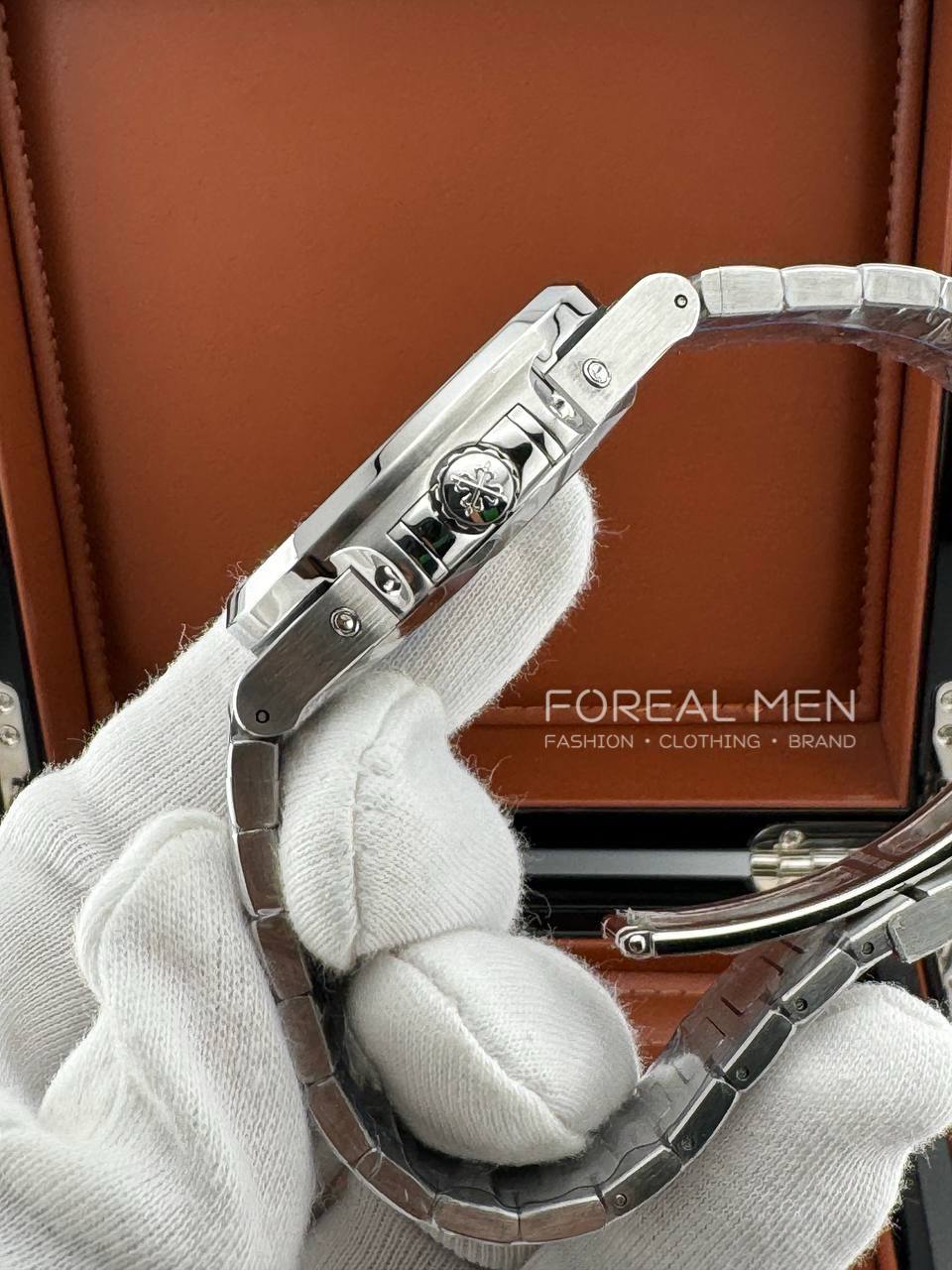 Patek Philippe Nautilus Stainless Steel Watch with White Dial & Annual Calendar