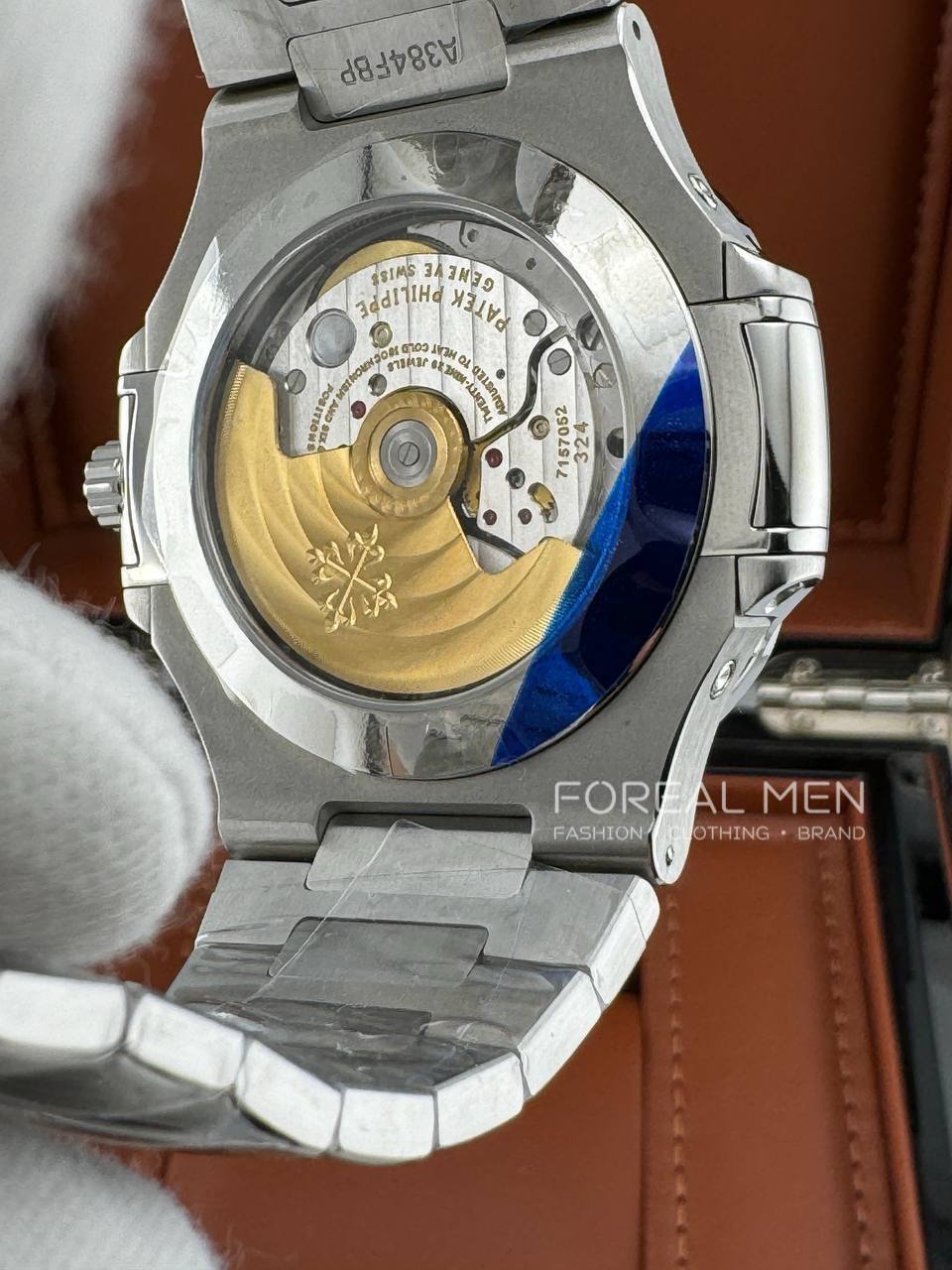 Patek Philippe Nautilus Stainless Steel Watch with White Dial & Annual Calendar