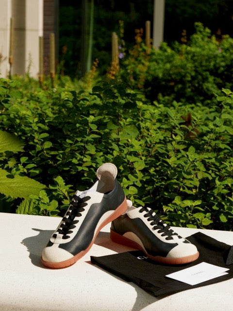 Chanel Black & White Leather Low-Top Sneakers with Oversized CC Logo & Gum Sole