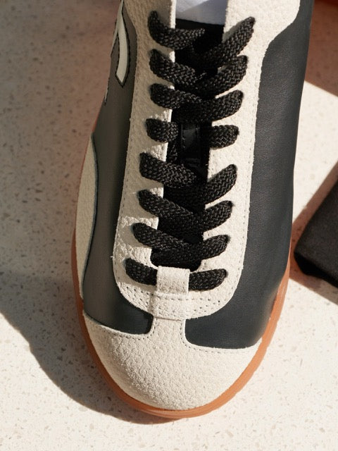 Chanel Black & White Leather Low-Top Sneakers with Oversized CC Logo & Gum Sole