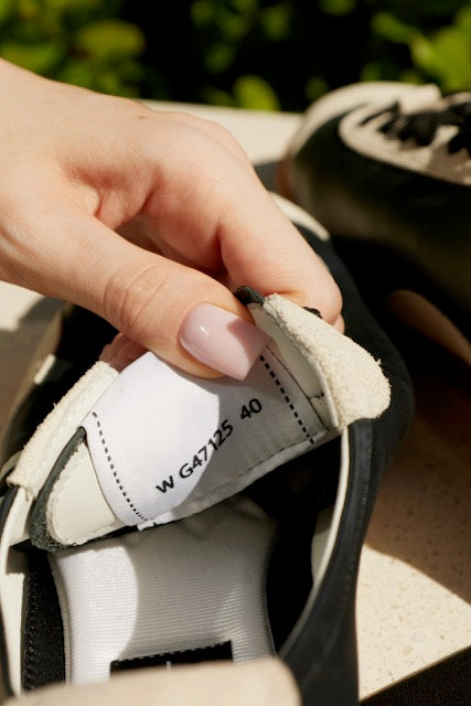 Chanel Black & White Leather Low-Top Sneakers with Oversized CC Logo & Gum Sole