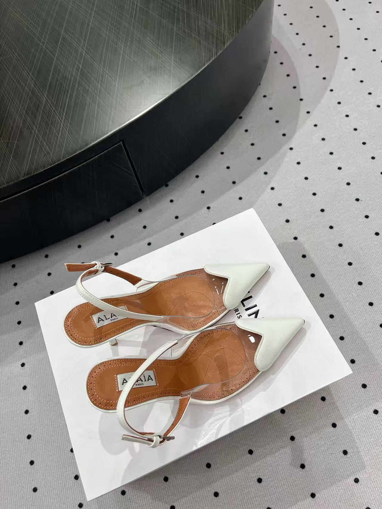 ALAIA HIGH 9 CM SLINGBACK IN WHITE PATENT CALFSKIN AND FILM - 35