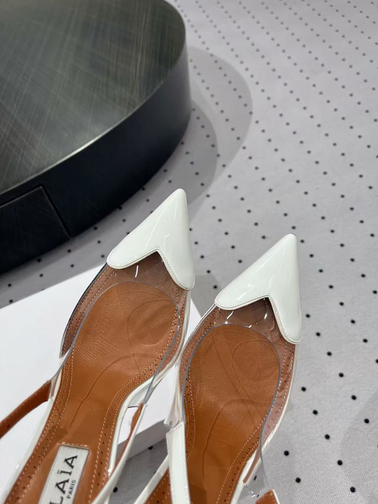 ALAIA HIGH 9 CM SLINGBACK IN WHITE PATENT CALFSKIN AND FILM - 35
