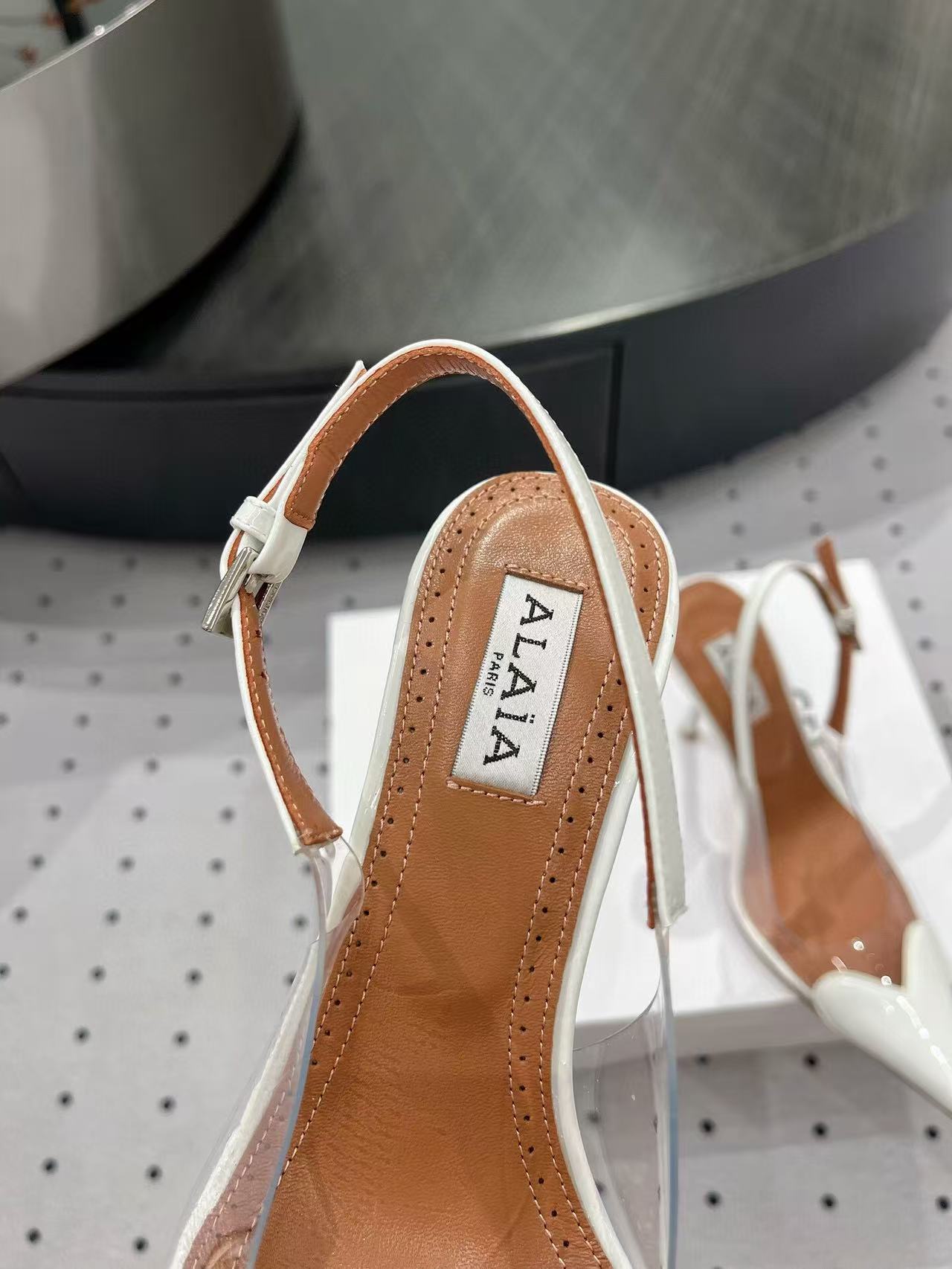 ALAIA HIGH 9 CM SLINGBACK IN WHITE PATENT CALFSKIN AND FILM - 35