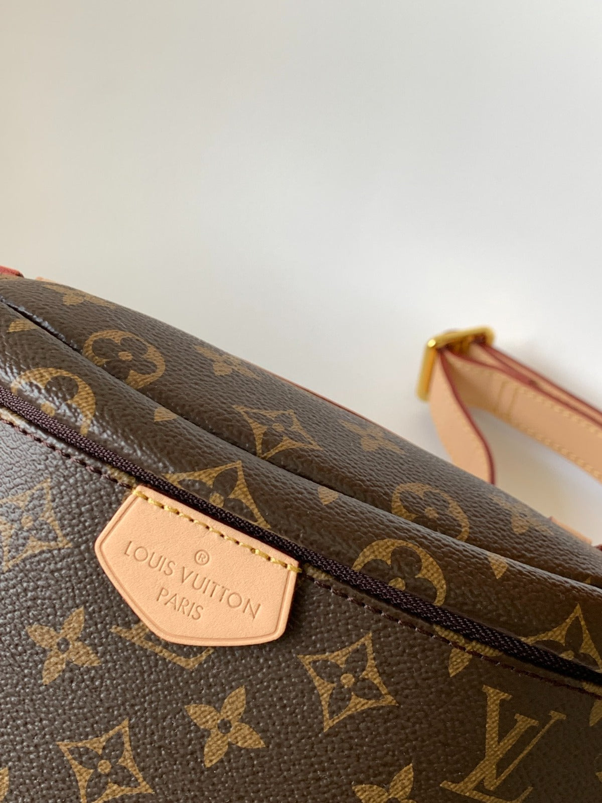 LV BUMBAG 37 IN BROWN COATED MONOGRAM CANVAS