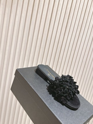 CHANEL 26S CAMELIA SLIPPERS IN BLACK LAMBSKIN BEADED