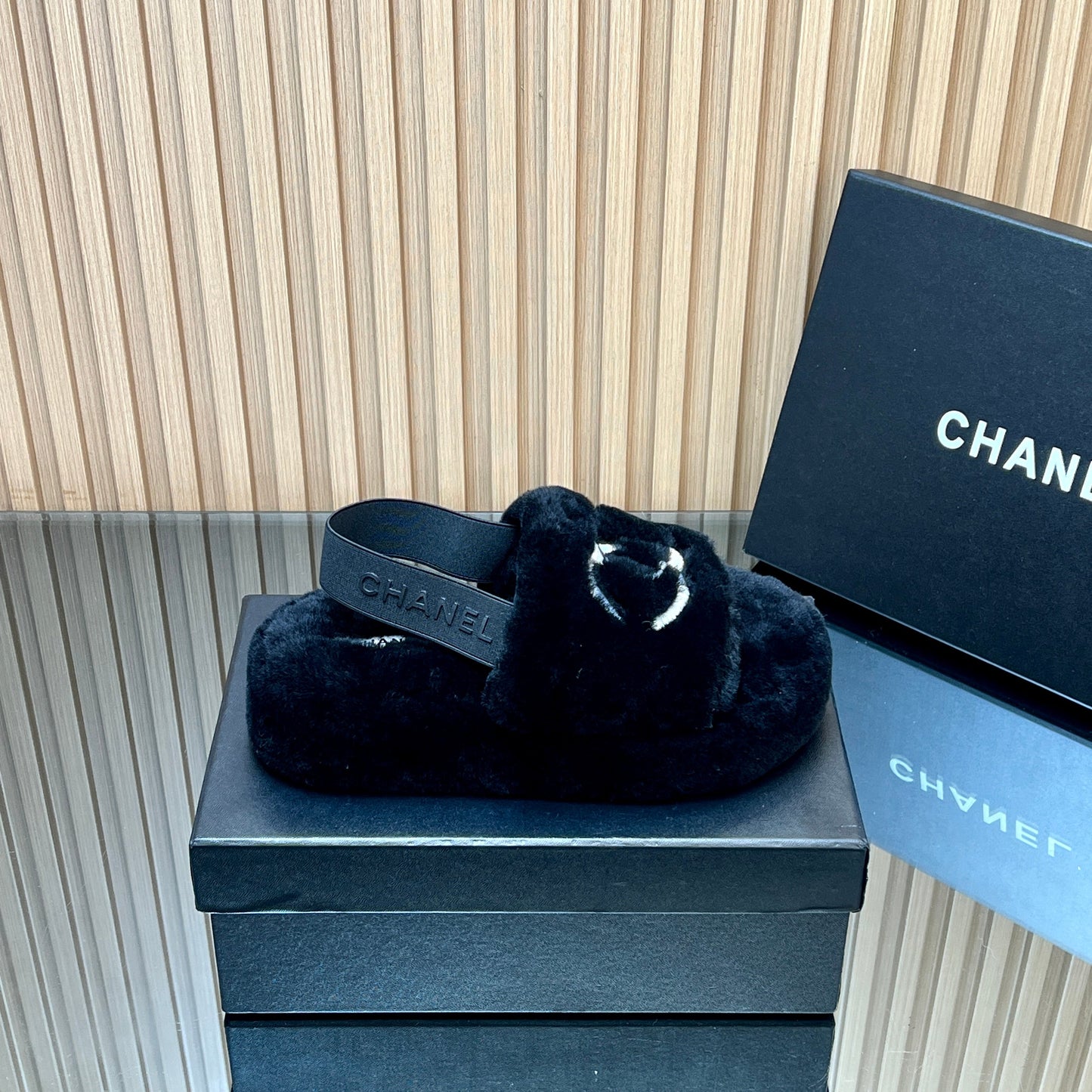CHANEL 25S THICK-SOLED FURRY SLIPPERS WITH ELASTIC STRAPS IN BLACK FUR - 35
