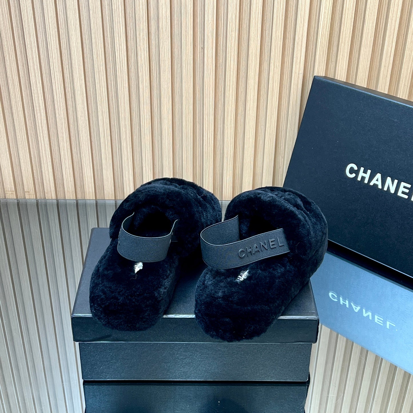CHANEL 25S THICK-SOLED FURRY SLIPPERS WITH ELASTIC STRAPS IN BLACK FUR - 35