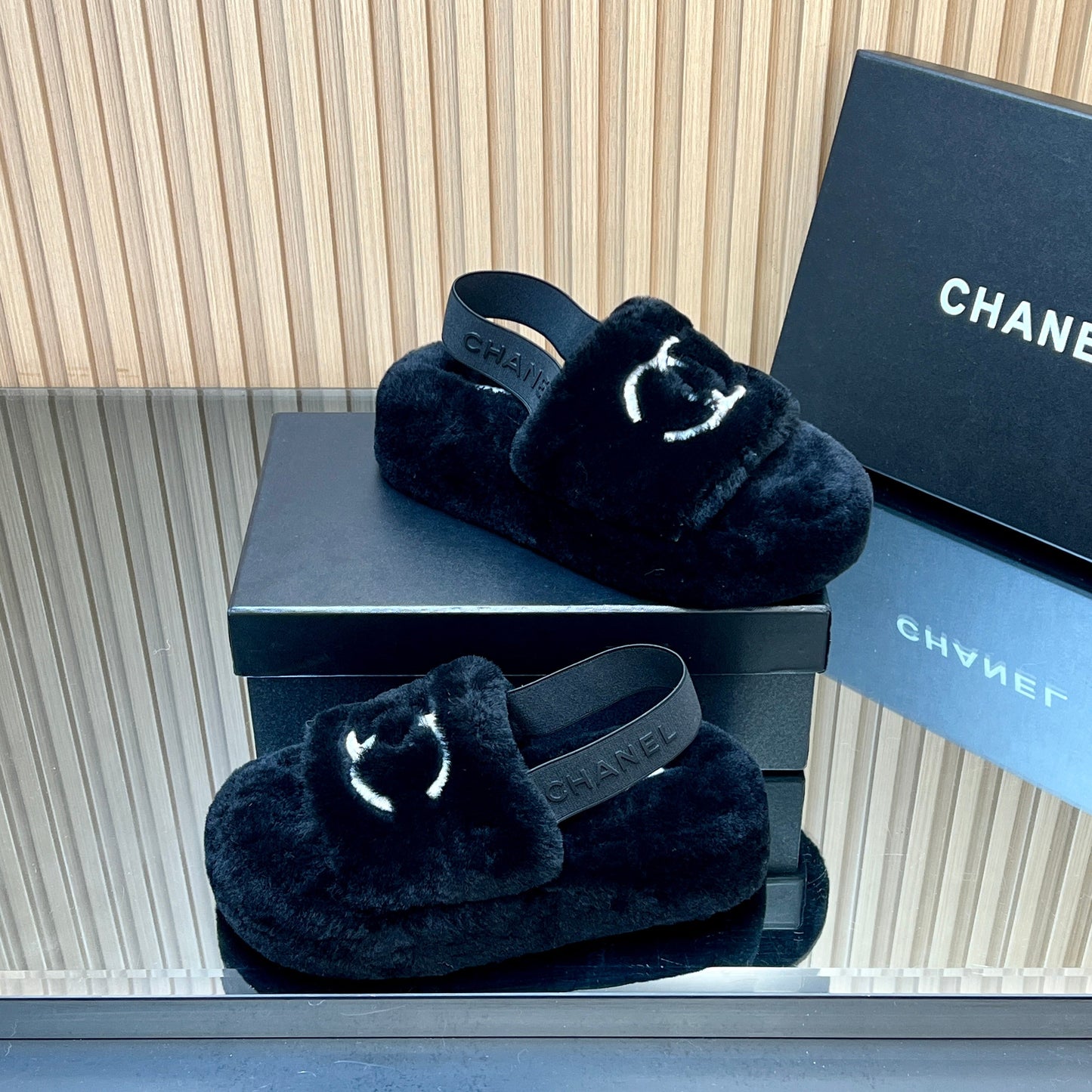 CHANEL 25S THICK-SOLED FURRY SLIPPERS WITH ELASTIC STRAPS IN BLACK FUR - 35