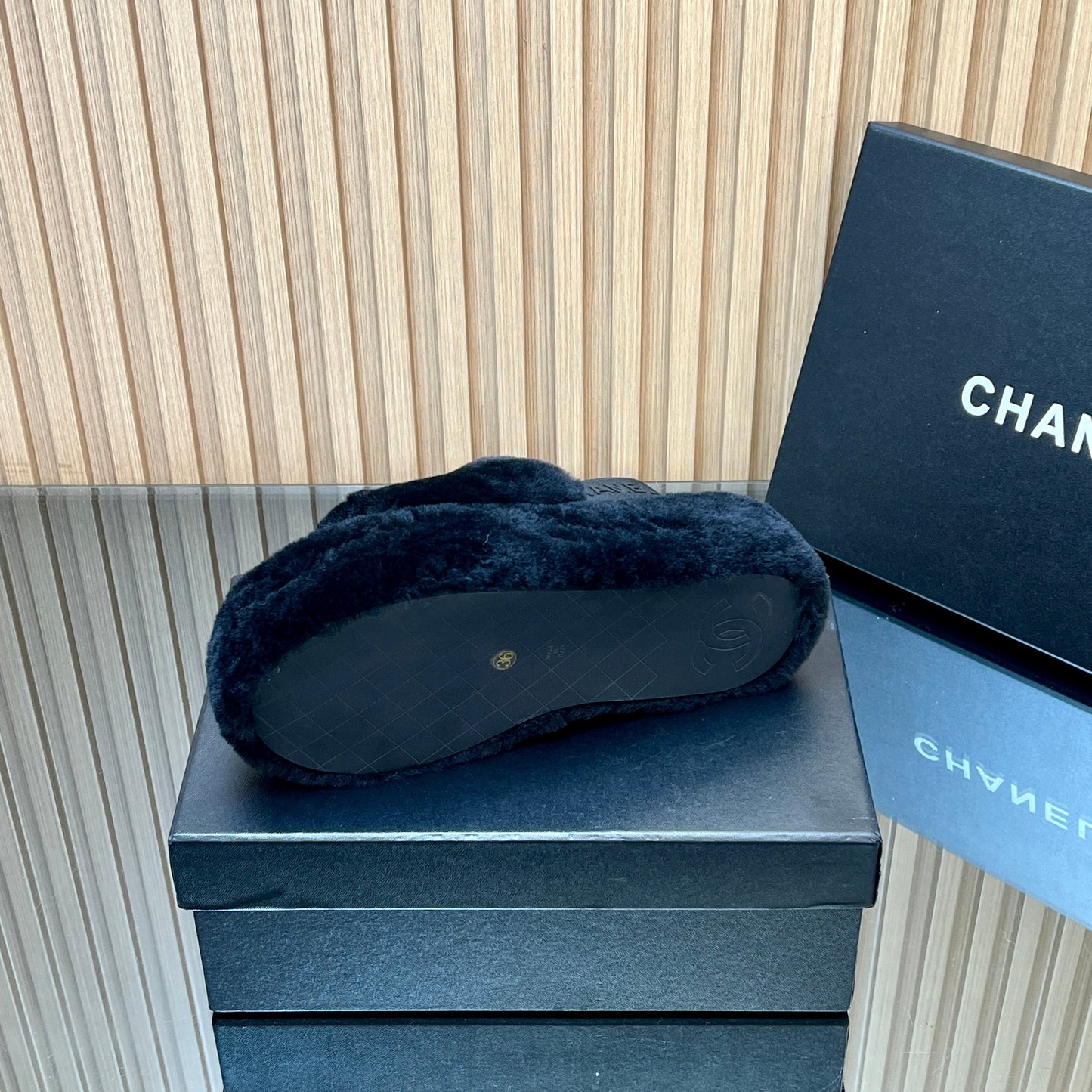 CHANEL 25S THICK-SOLED FURRY SLIPPERS WITH ELASTIC STRAPS IN BLACK FUR - 35